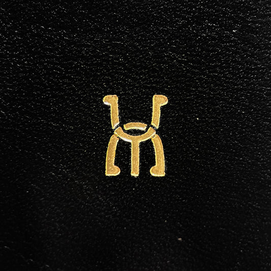 Gold foil monogram and logo